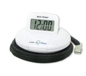 Travel vibrating alarm clock with vibrator